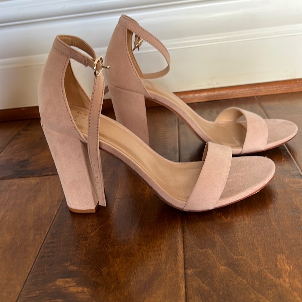 Nude/verrrry light blush colored ankle strap heels. Worn at one wedding